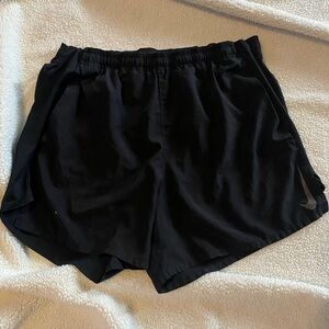 Nike Men’s Athletic Black Shorts size large (in used condition)